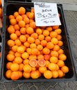 ripe oranges for sale with label and price in italian language Royalty Free Stock Photo