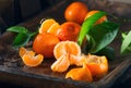 Ripe oranges or tangerines on a wooden table. Beautiful Healthy organic juicy mandarins closeup. Organic citrus fruits