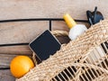 Ripe oranges, wicker basket and sunglasses. Top view