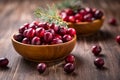 Ripe organic cranberries in wooden bowl on wooden background Royalty Free Stock Photo