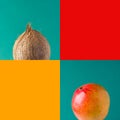 Ripe organic juicy colorful mango coconut on solid dark green turquoise backdrop. Duotone red yellow background with blank squares