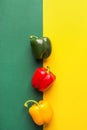 Ripe organic vegetables colorful red yellow green bell peppers on duotone background. Healthy plant based diet Royalty Free Stock Photo