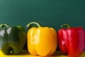 Ripe organic vegetables colorful red yellow green bell peppers on duotone background. Healthy plant based diet Royalty Free Stock Photo