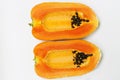 Ripe papaya half cut on white