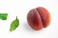 Ripe peach. Whole peach fruits with leaf isolated on white background.