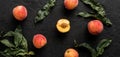 Ripe peaches on black stone background. Healthy food concept, top view, pattern.