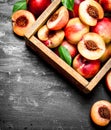 Ripe peaches in an old box. Royalty Free Stock Photo