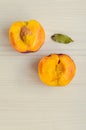 Ripe peaches on white wooden background Royalty Free Stock Photo