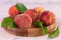 Ripe peaches on a wooden tray.Close-up. Royalty Free Stock Photo