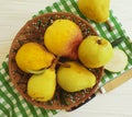 Ripe pear bio on a plate vitamin rustic harvest nutrition on a white wooden background