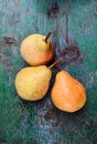 Ripe pears on green wooden table Royalty Free Stock Photo