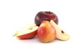 Ripe pears and red apple over a white background Royalty Free Stock Photo