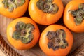 Ripe persimmon fruit in basket, Autumn fruit Royalty Free Stock Photo