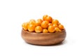 Ripe physalis in wooden bowl on white background Royalty Free Stock Photo