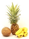 Ripe pineapple, bananas and coconut close-up
