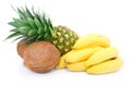 Ripe pineapple, bunch of bananas and coconut Royalty Free Stock Photo