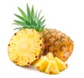 Ripe pineapple with lush greenery and vibrant slices isolated on white