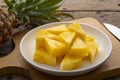 Ripe pineapple slice on white plate Royalty Free Stock Photo