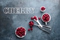 Ripe pitted cherries, frozen fruits and berries on a dark background. A place for text, a view from above. Flat lay Royalty Free Stock Photo