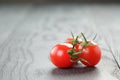 Ripe plum tomatoes on wood table Royalty Free Stock Photo
