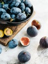 Ripe plums and sweet black figs Royalty Free Stock Photo