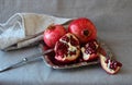 Ripe pomegranate, cut into pieces Royalty Free Stock Photo