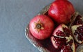 Ripe pomegranate, cut into pieces Royalty Free Stock Photo