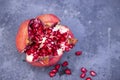 Ripe pomegranate fruit on dark background, closeup Royalty Free Stock Photo