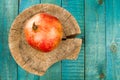 Ripe pomegranate fruit on wooden vintage background. Healthy vegetarian food. Royalty Free Stock Photo