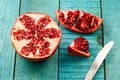 Ripe pomegranate fruit on wooden vintage background. Healthy vegetarian food. Royalty Free Stock Photo