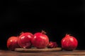 Ripe pomegranate fruit on wooden vintage background. - Image