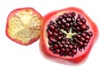 Ripe pomegranate and intact grains. Royalty Free Stock Photo