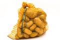 Ripe potatoes in burlap sack isolated Royalty Free Stock Photo