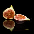 Ripe purple fig fruit cut in half Royalty Free Stock Photo