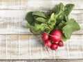 Ripe radish bunch on a wooden table Royalty Free Stock Photo