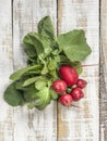 Ripe radish bunch on a wooden table Royalty Free Stock Photo