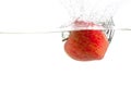 ripe red apple and clear water splash isolated on white Royalty Free Stock Photo