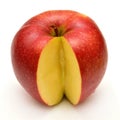 Ripe red apple closeup cut a slice Royalty Free Stock Photo