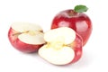 A Ripe Red Apple With Leaf and two halves Royalty Free Stock Photo