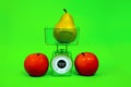 Ripe red apple pear kitchen scales fitness diet food nutrition correct yellow green Royalty Free Stock Photo