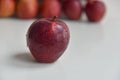 Red apples in a matting bag