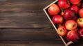 Ripe red apples in wooden box. Top view with space for your text. Generative AI Royalty Free Stock Photo