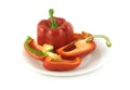 Ripe red bell peppers on a plate isolated Royalty Free Stock Photo