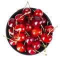 Ripe red cherries. Bowl full of sweet cherries on isolated white background. File contains clipping path Royalty Free Stock Photo