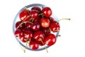 Ripe red cherries. Bowl full of sweet cherries on isolated white background. File contains clipping path Royalty Free Stock Photo