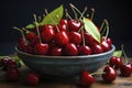 Ripe red cherries in a bowl and next to it on wooden table Royalty Free Stock Photo