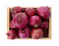 Ripe red onions in wooden crate isolated, top view Royalty Free Stock Photo