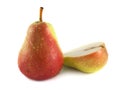 Ripe red pear with half on white (water drop) Royalty Free Stock Photo