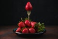 Ripe red strawberries on a fork in a heap of strawberries Royalty Free Stock Photo