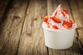 Ripe red strawberries and frozen yogurt Royalty Free Stock Photo